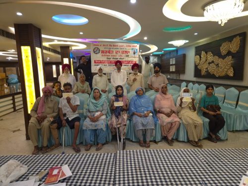 Sarbat Da Bhala Trust Distributes Pension Cheques to Disabled Beneficiaries in Sangrur